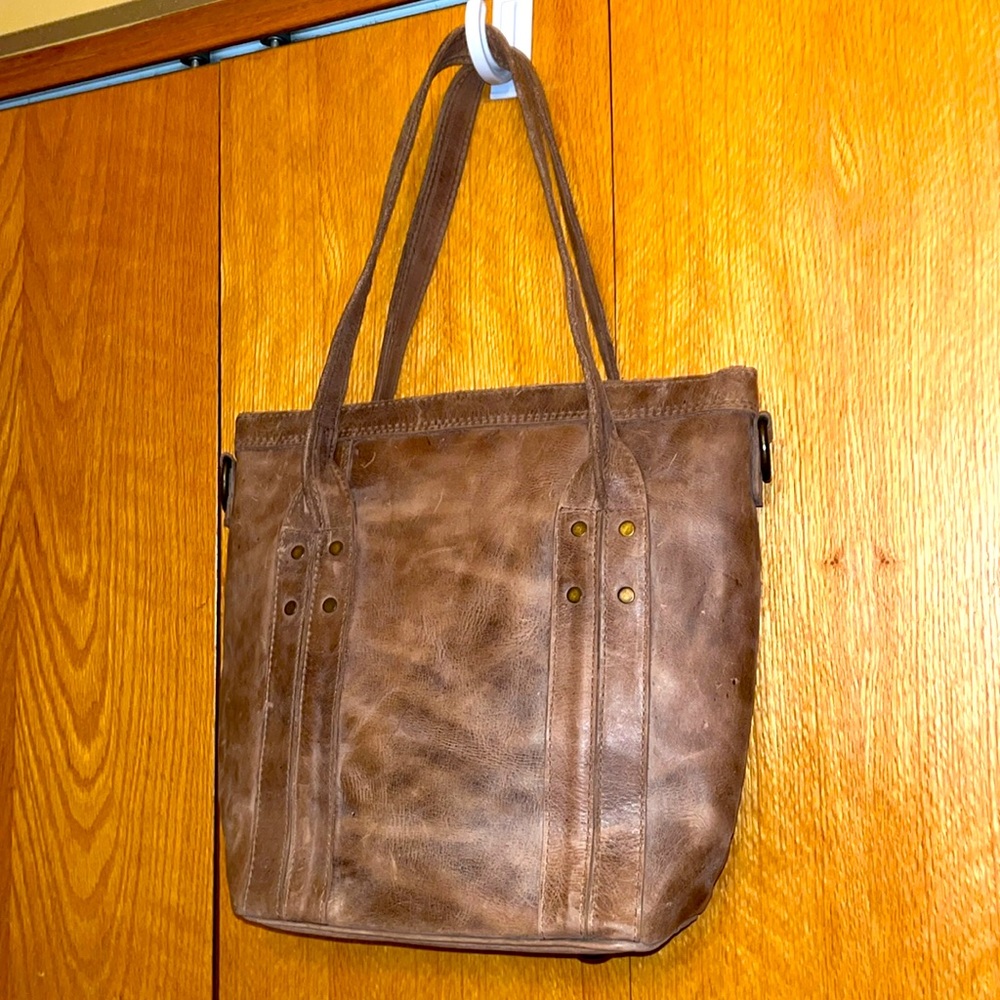VERY RARE Kyrie distressed full grain tan leather tassel tote bucket bag EUC
